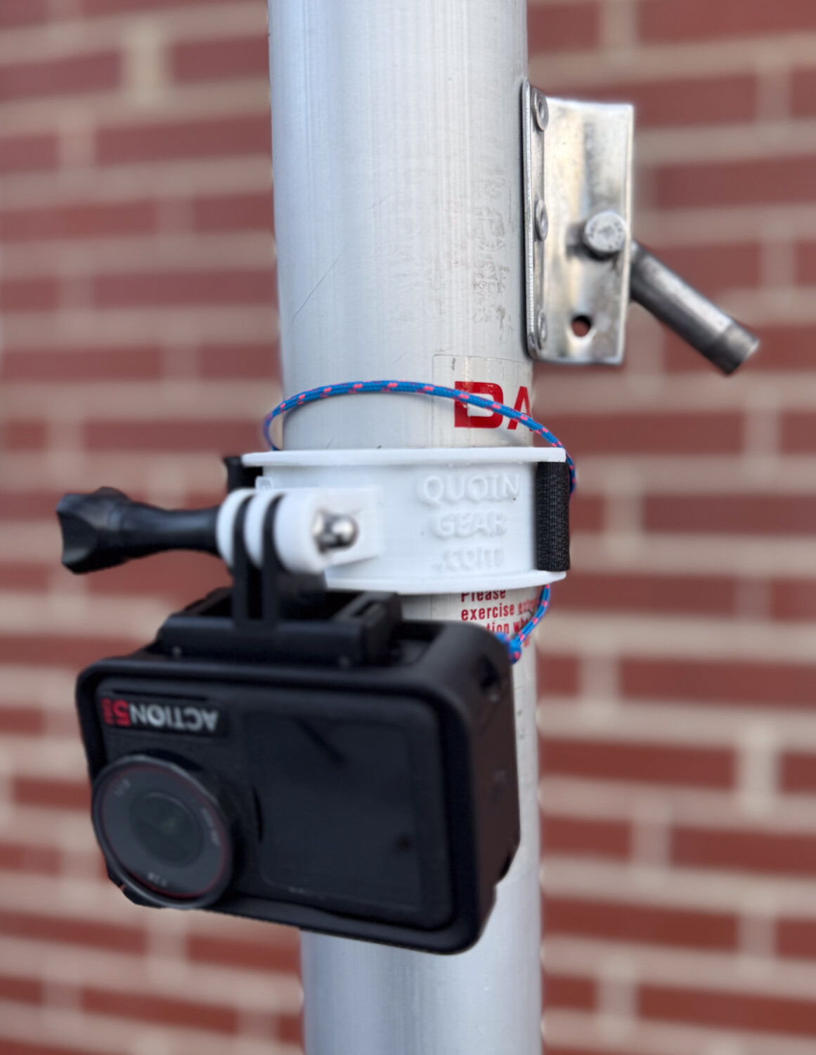 ILCA Mast mount with DJI Osmo Action 5 just below the gooseneck